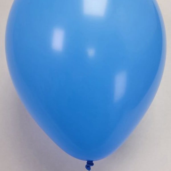Single blue balloon on a plain background