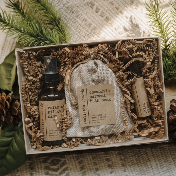Gift box with bath soak, pillow mist, and a small bottle of blend