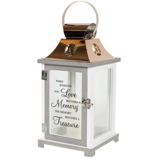 Decorative lantern with a memorial quote on the glass panels