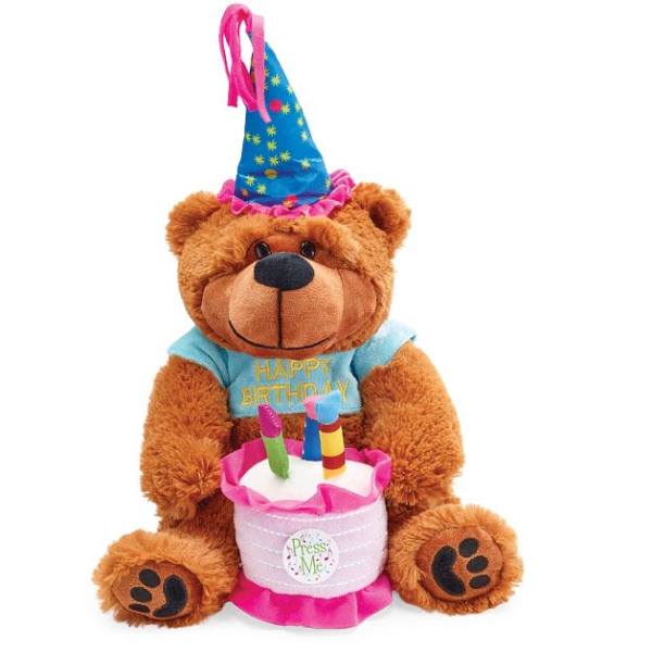 Birthday teddy bear plush with party hat holding a pink cake with candles
