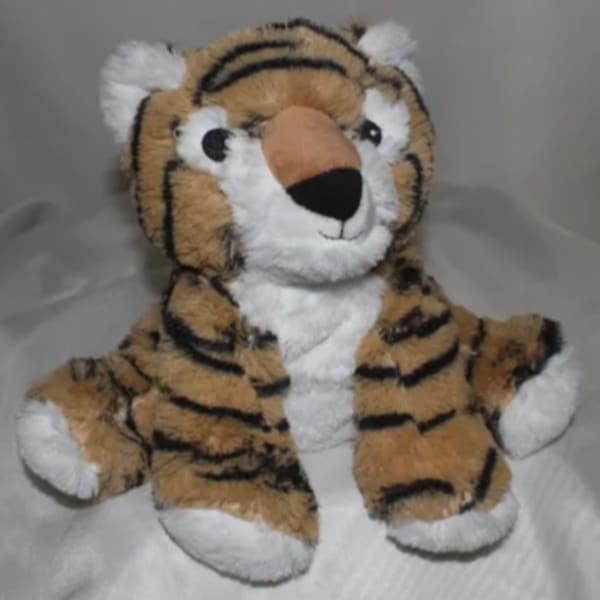 Plush tiger stuffed animal with orange and black stripes