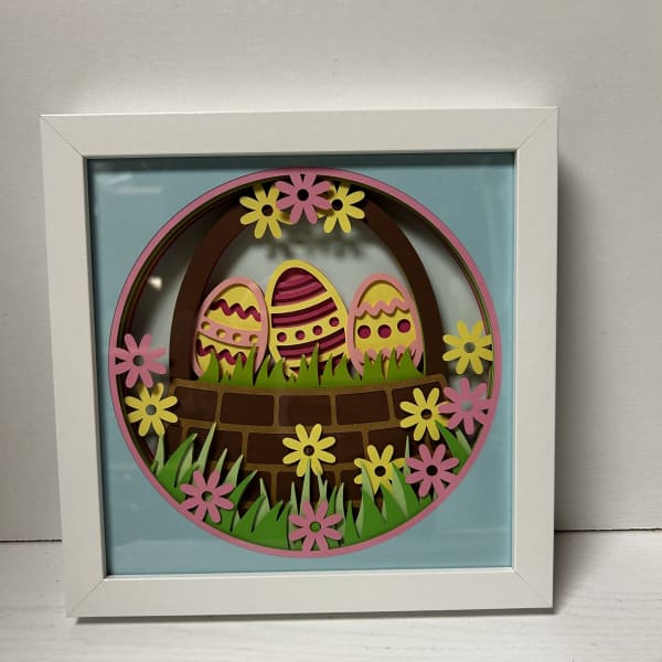 Framed Easter egg paper art with flowers and grass