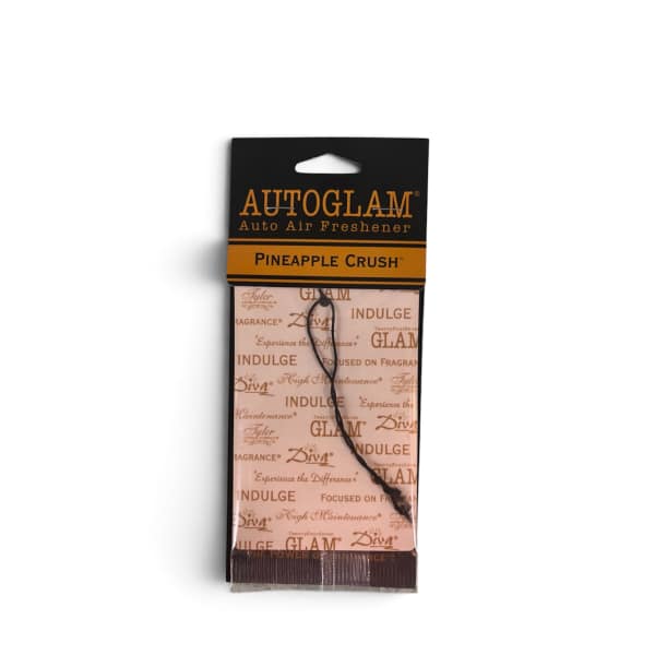 Packaged pineapple-scented car air freshener with black and orange label
