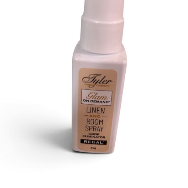 Pink linen and room spray bottle with a white cap