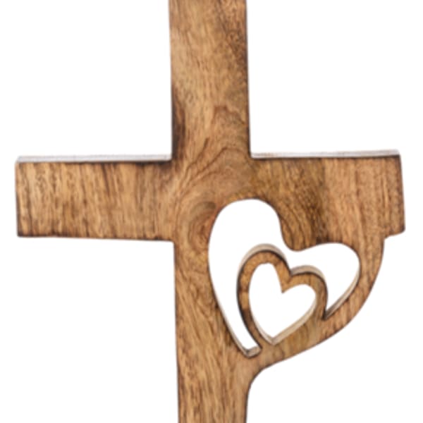 Wooden cross with a heart cutout on a base