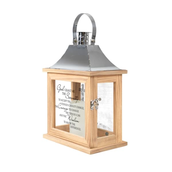 Wooden lantern with a metal top and glass panels