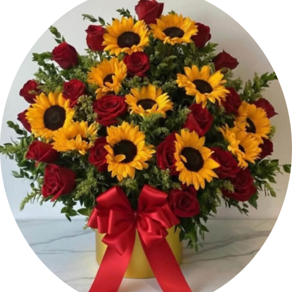 Sunflowers and red roses in a yellow box with a red ribbon