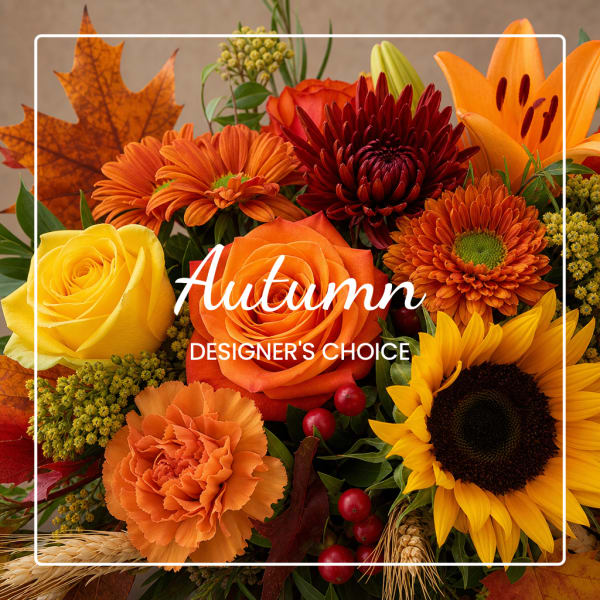 Autumn bouquet with roses, sunflowers, and orange blooms