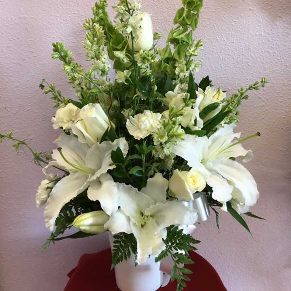 With Sympathy By Forever Flowers