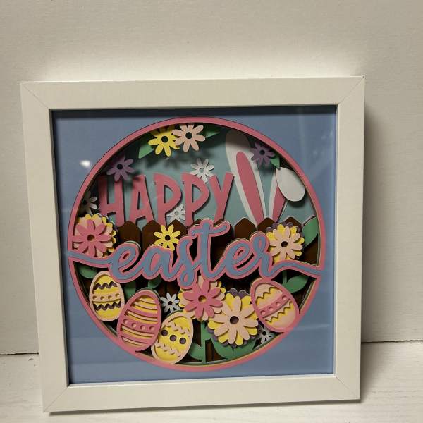 Framed Easter sign with flowers and decorated eggs