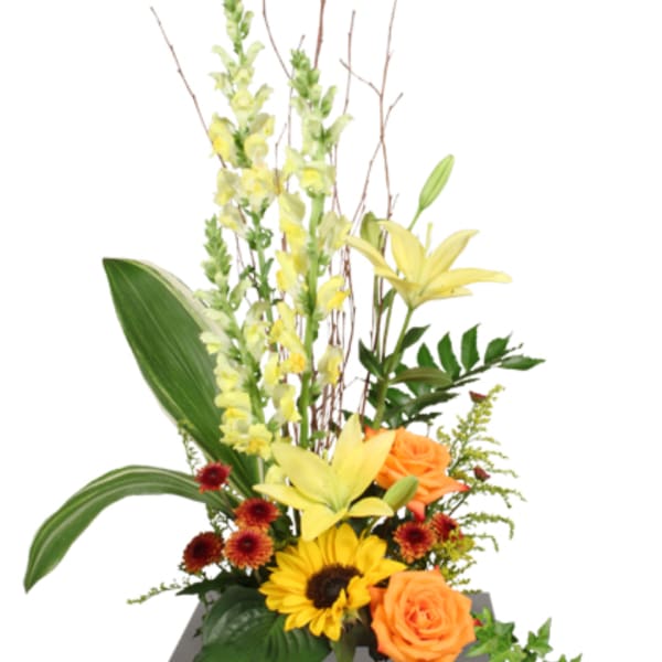 Tall mixed bouquet with yellow lilies, orange roses, and a sunflower