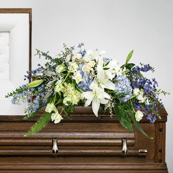 Angelic embrace casket spray