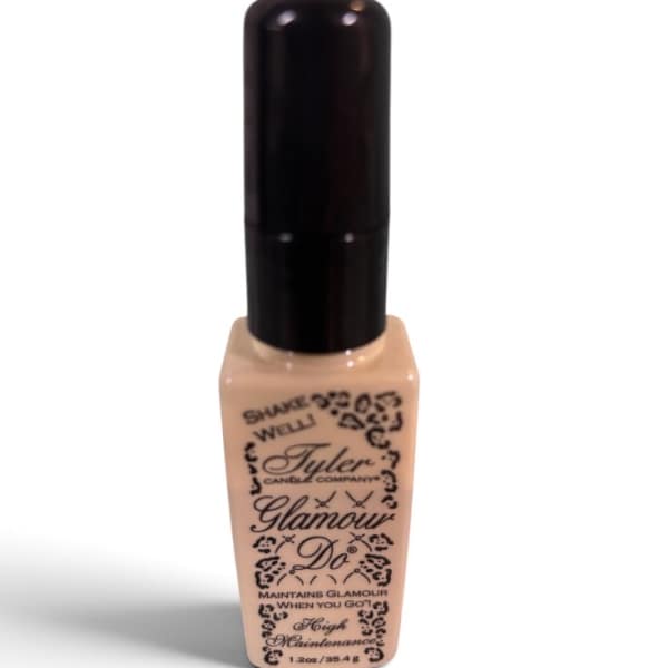 Beige nail polish bottle with a black cap and printed label