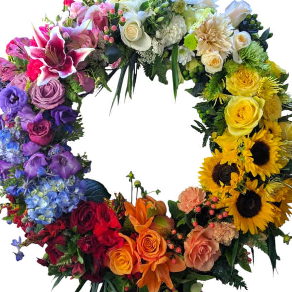 Colorful floral wreath with roses, lilies, and sunflowers