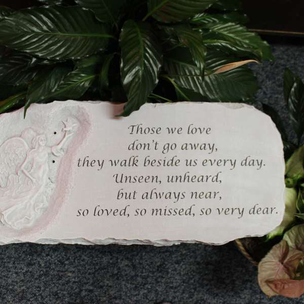 Memorial plaque with an angel relief and engraved sympathy verse