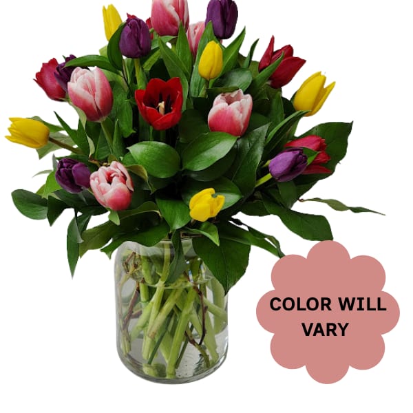 Mixed tulip bouquet in a clear glass vase