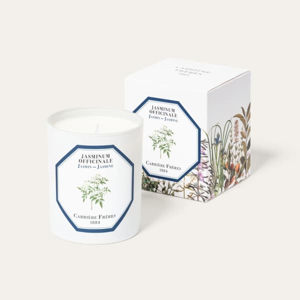 White jasmine-scented candle in a glass jar with matching box