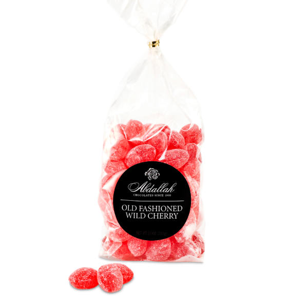Bag of red cherry candies with a black label