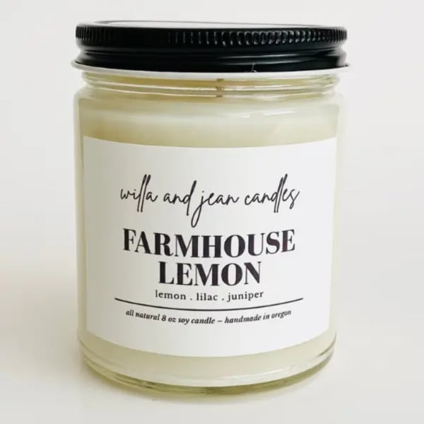 Jar candle with a black lid and Farmhouse Lemon label