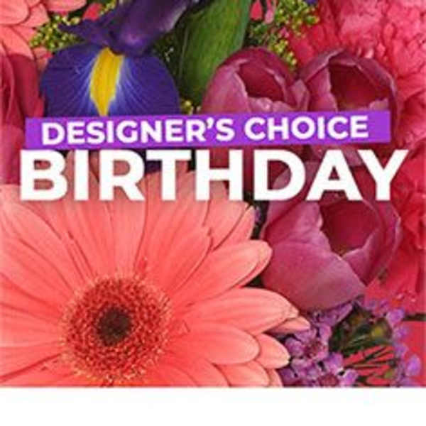Bright mixed bouquet with pink gerbera daisy, purple iris, and pink blooms with birthday text overlay