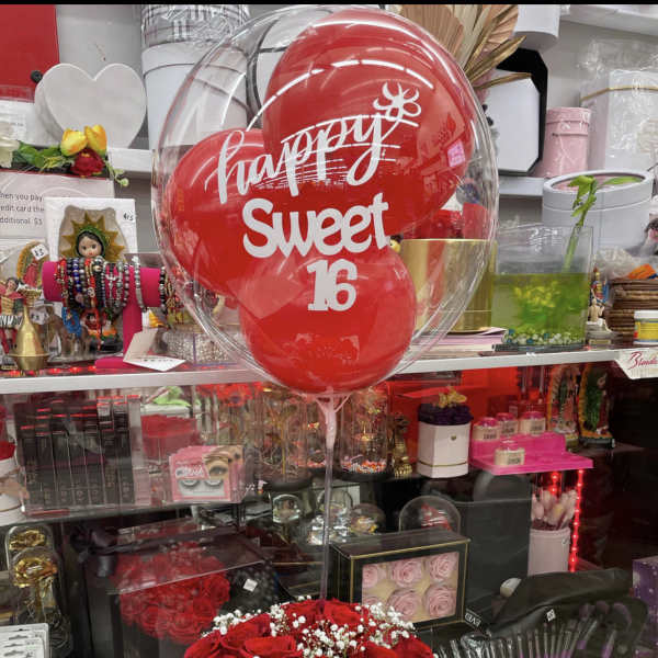 Red rose arrangement with a Sweet 16 balloon in a white hatbox