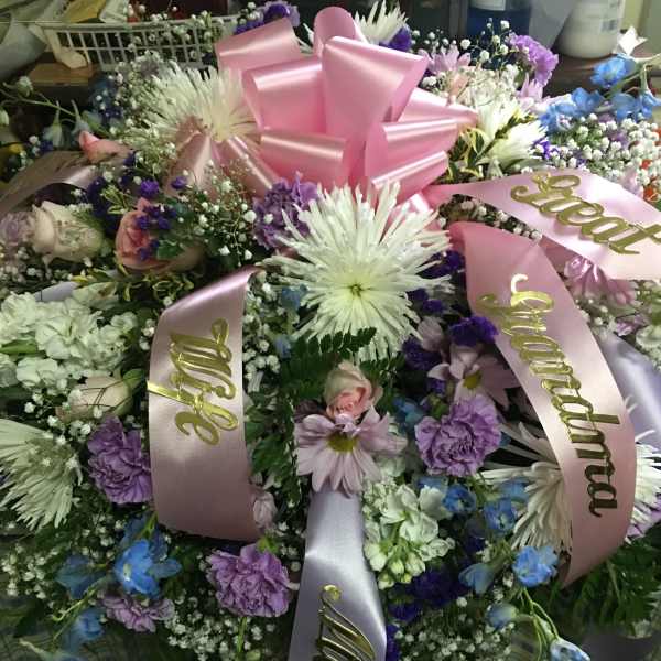 Spring colors casket spray