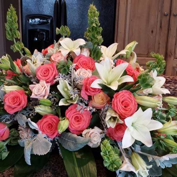 Timeless Blessings Casket Spray by Simply Flowers