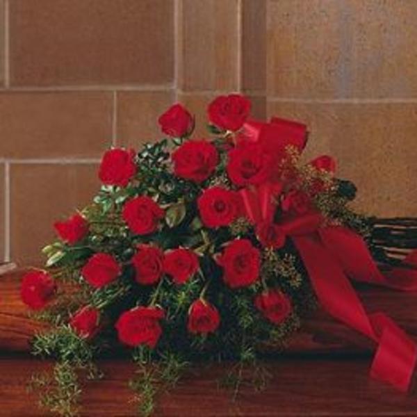 Bouquet of red roses tied with a red ribbon