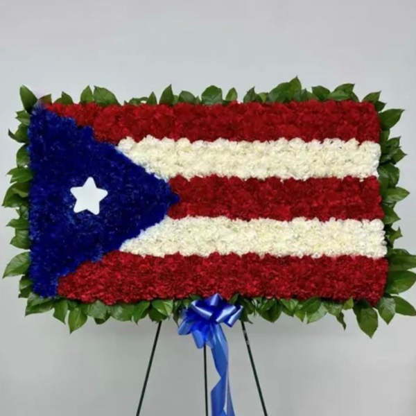 Floral standing display arranged like the Puerto Rico flag on an easel