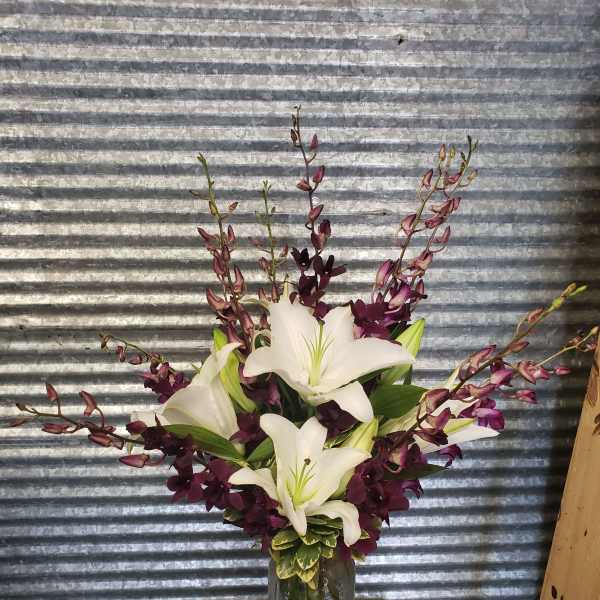 Purple orchid and Lilies