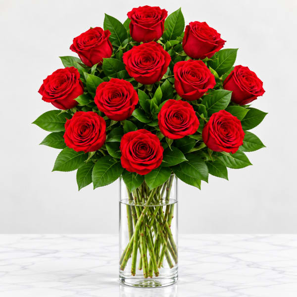 Bouquet of red roses in a clear glass vase