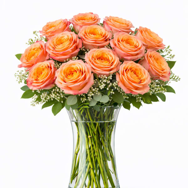 Bouquet of peach roses in a clear glass vase