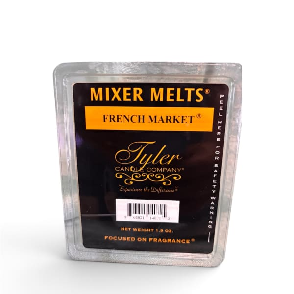 Packaged Tyler Candle Company wax melts in a clear plastic clamshell