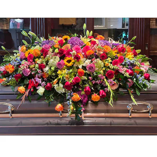 Large casket spray with mixed colorful flowers