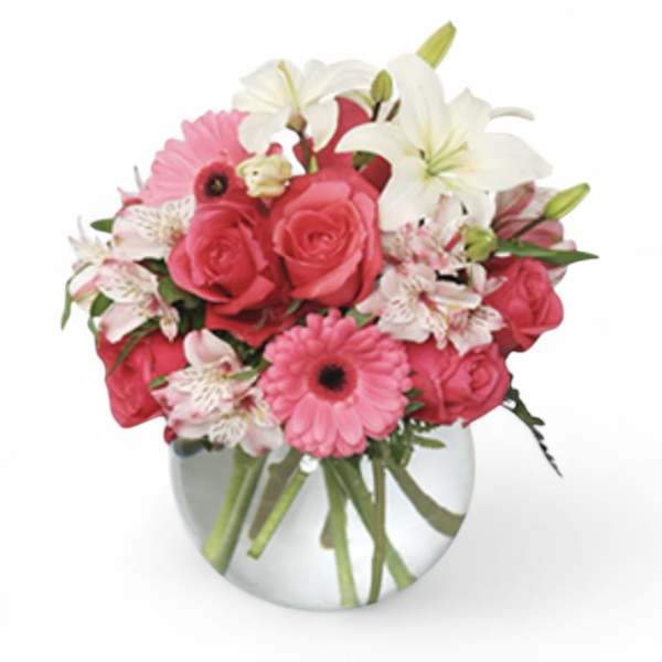 Pink and white mixed bouquet in a clear glass vase