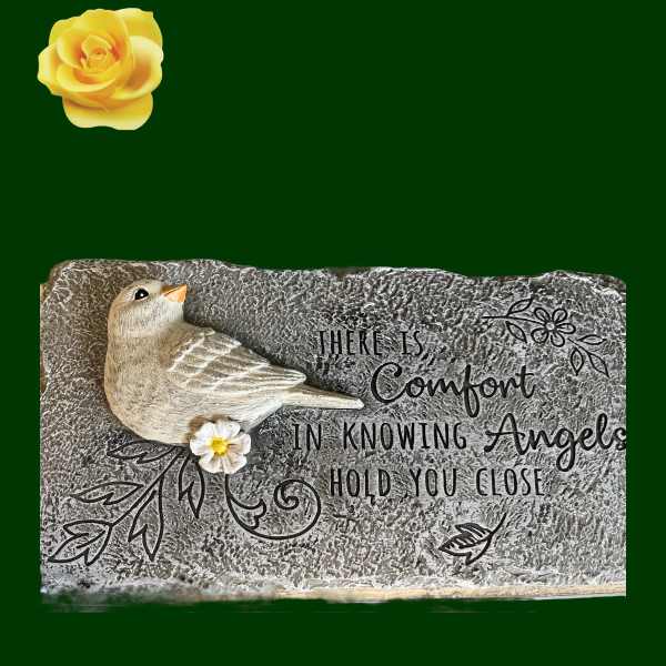 Decorative memorial plaque with a bird and a yellow rose