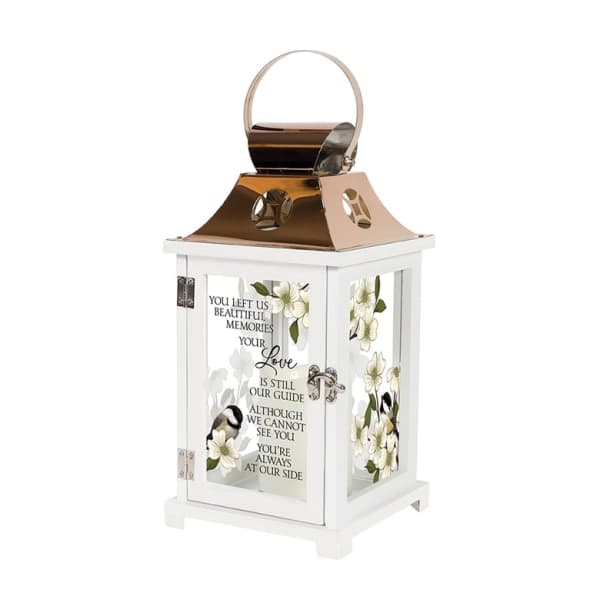 White memorial lantern with floral panels and a sympathy message