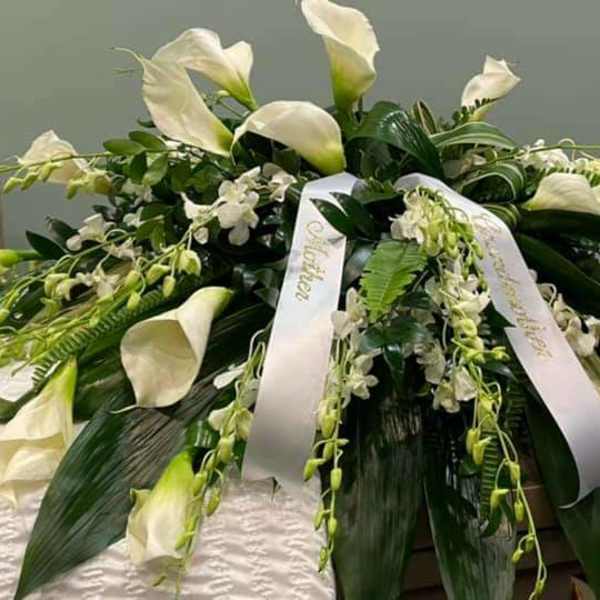 White Orchid and Calla Casket spray