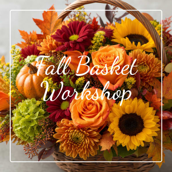 Fall flower basket with roses, sunflowers, and chrysanthemums in a wicker basket