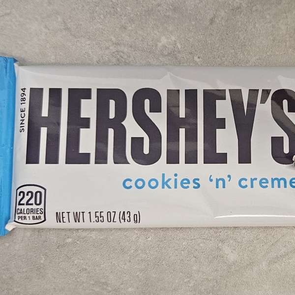 Hershey's Cookies 'n' Creme candy bar in a blue wrapper