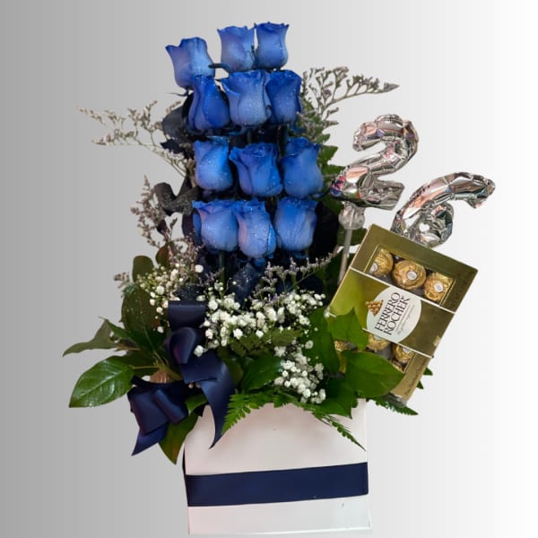 Blue roses in a gift box with Ferrero Rocher chocolates and silver number balloons.