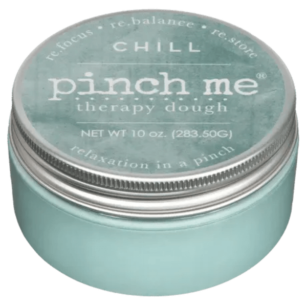 A teal tin labeled "pinch me therapy dough"
