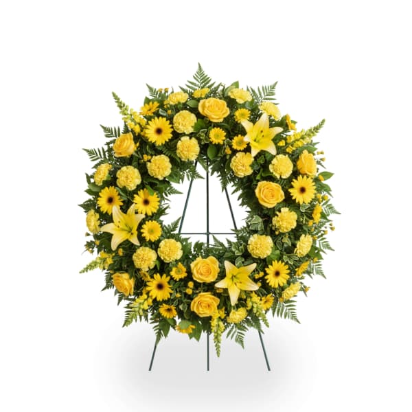 Yellow floral wreath on a standing easel