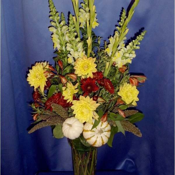Tall rust mum Autumn arrangement with pumpkins