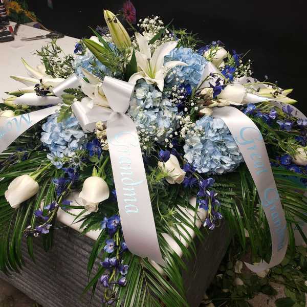 Blue and White casket Spray