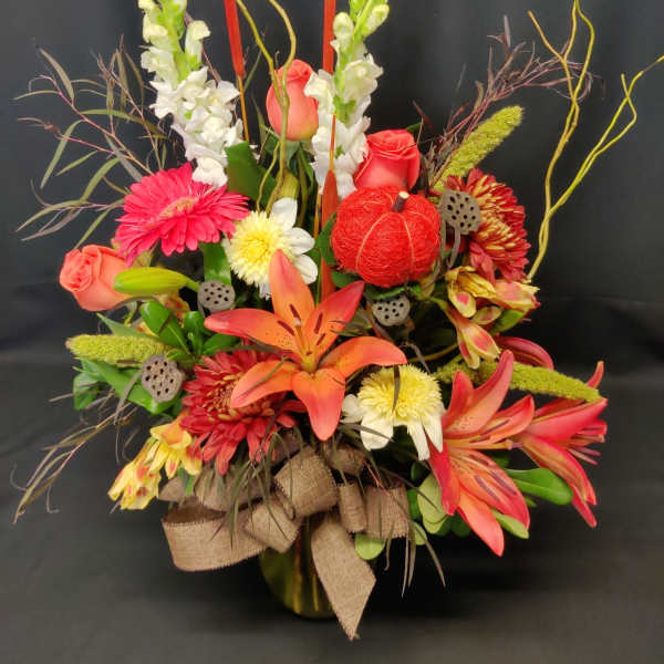 Lily autumn bouquet with cattails