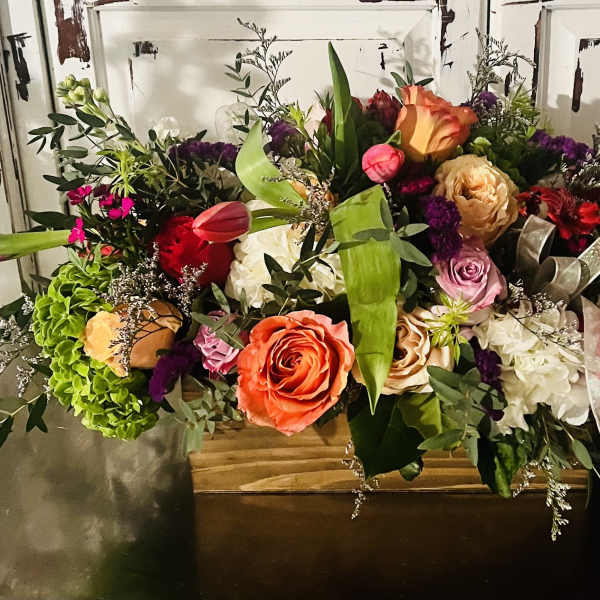 Large mixed bouquet with roses, tulips, and hydrangeas in a box