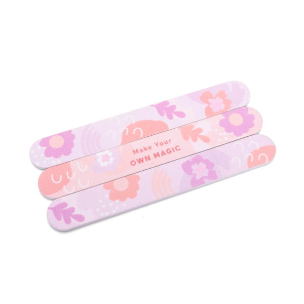 Three floral-patterned nail files with pink and purple designs