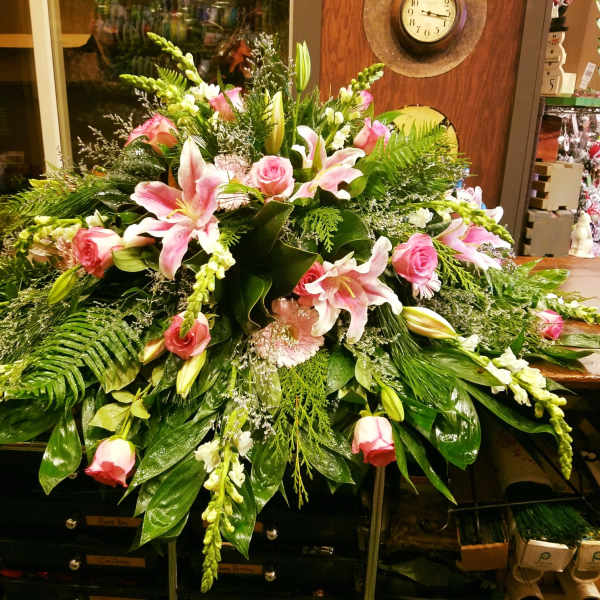 Large pink and white floral spray with lilies and roses