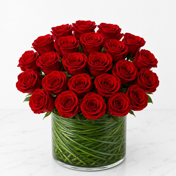 Bouquet of red roses in a clear glass vase